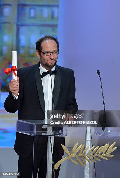 Mexican director Carlos Reygadas delivers a speech after being awarded with the Best Director award for his film "Post Tenebras Lux" during the...