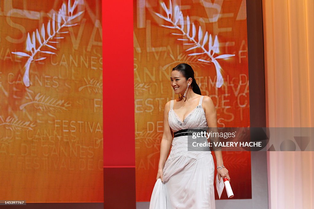 Chinese actress Gong Li smiles as she ar
