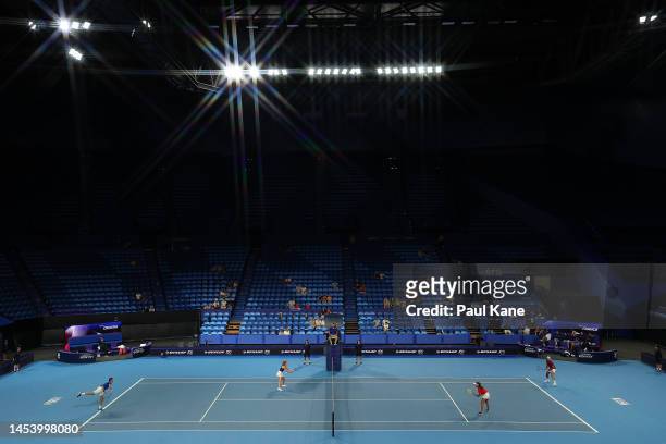 General view of play of the mixed doubles match between Jessika Ponchet and Edouard Roger-Vasselin of France and Petra Marcinko and Matija Pecotic of...