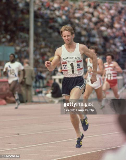 David Jenkins from Great Britain and the Gateshead Harriers crossing the finish line to win the Men's 400 Metres race during the 1976 AAA...