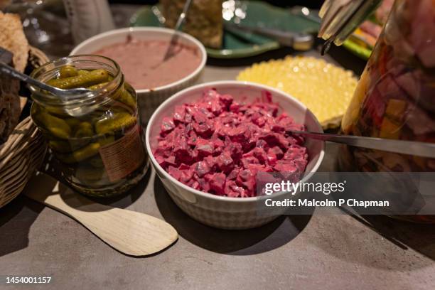 swedish julbord, christmas table - beetroot salad and gherkins - julbord stock pictures, royalty-free photos & images