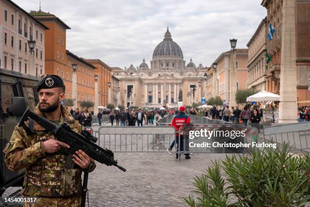 Military personnel stand guard ahead of the funeral Pope Emeritus Benedict XVI at St. Peter's Basilica on January 03, 2023 in Vatican City, Vatican....