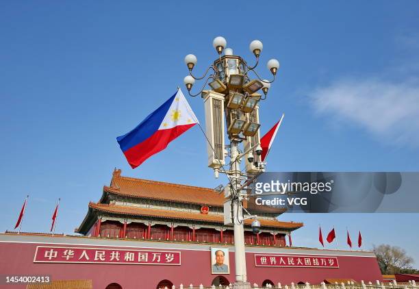 The national flags of the Philippines and China flutter at Tiananmen Square during the visit of Philippine President Ferdinand Romualdez Marcos Jr....