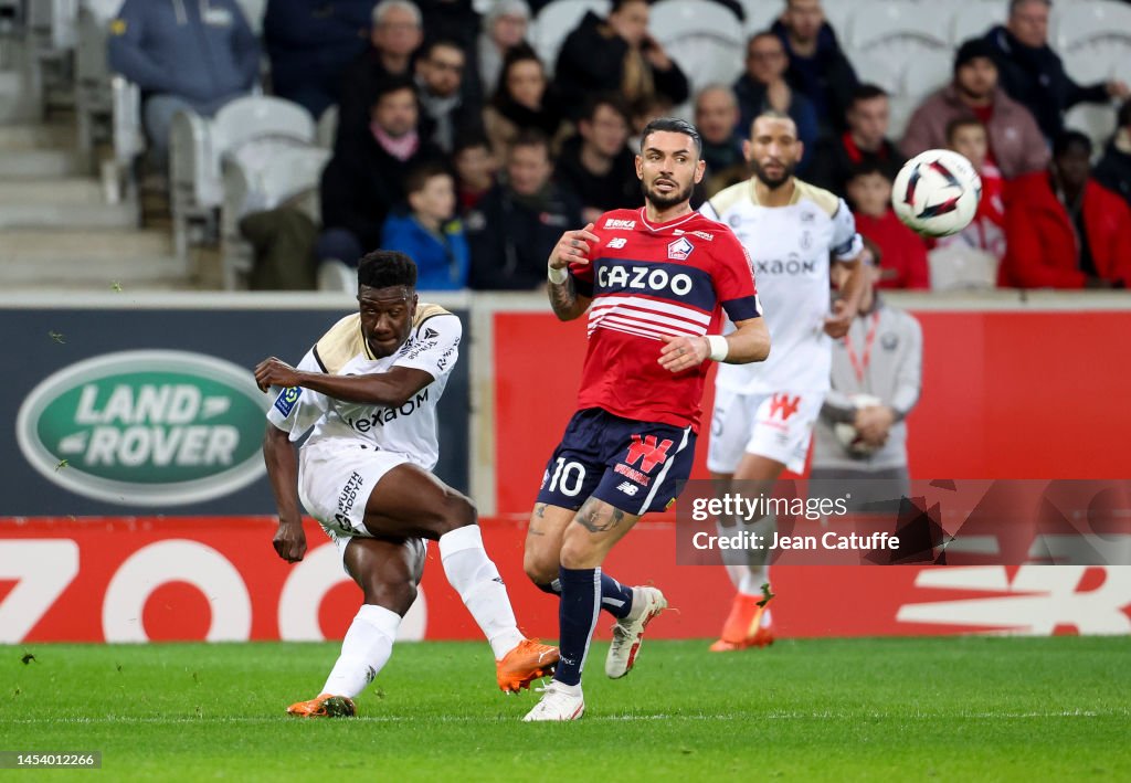 Remi Mantel Reims Azor Matusiwa of Reims, Remy Cabella of Lille during the Ligue 1 ...