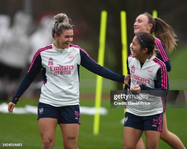 Laura Wienroither and Mana Iwabuchi of Arsenal during the Arsenal Women's training session at London Colney on January 03, 2023 in St Albans, England.