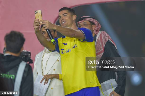 Cristiano Ronaldo takes a selfie after being unveiled as an Al Nassr player at Mrsool Park Stadium on January 3, 2023 in Riyadh, Saudi Arabia.