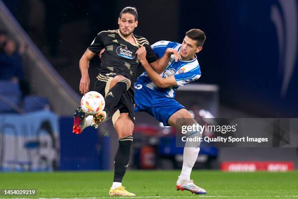 Gonçalo Paciencia of RC Celta de Vigo hurt for the ball with Cesar Montes of RCD Espanyol during the Copa del Rey Round of 32 match between RCD...