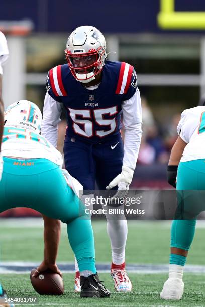 Josh Uche of the New England Patriots plays defense against the Miami Dolphins at Gillette Stadium on January 01, 2023 in Foxborough, Massachusetts.