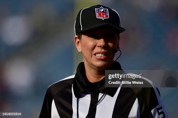 Referee Sarah Thomas reacts during a game between the New England Patriots and the Miami Dolphins at Gillette Stadium on January 01, 2023 in...