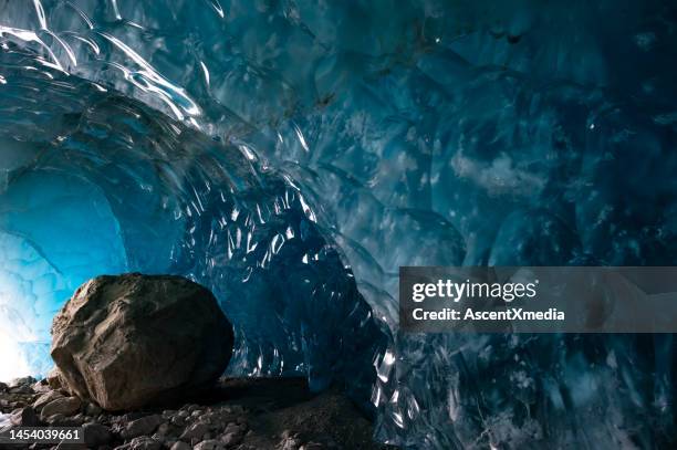 inside a glacial ice cave - ice cave imagens e fotografias de stock