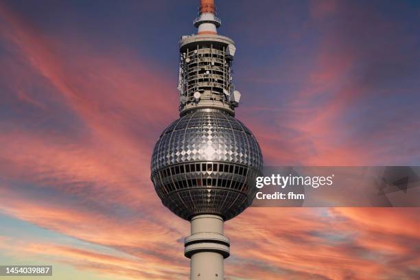 berlin - television tower at sunset (germany) - television tower berlin stock-fotos und bilder