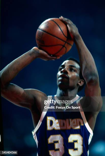 David Thompson of the Denver Nuggets looks to shoot a free-throw against the Washington Bullets during an NBA basketball game circa 1978 at The...