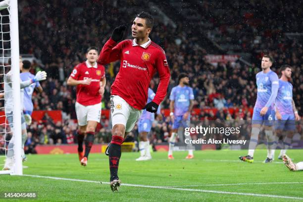 Casemiro of Manchester United celebrates after scoring the team's first goal during the Premier League match between Manchester United and AFC...