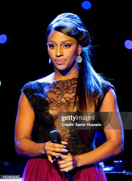 Alexandra Burke performs during the World Hunger Day in Support Of The Hunger Project concert with Dionne Warwick and friends at The Royal Albert...