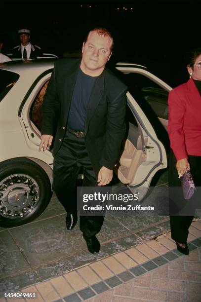 Michael Chiklis and wife Michelle Moran getting out the car to attend Cheryl Kagan's Wedding at Four Seasons Hotel in New York City, New York, United...