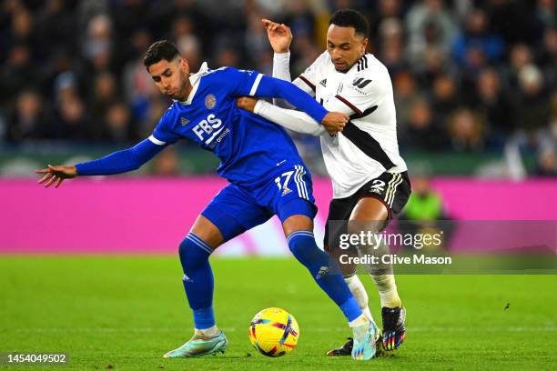 Ayoze Perez of Leicester City is challenged by Kenny Tete of Fulham during the Premier League match between Leicester City and Fulham FC at The King...