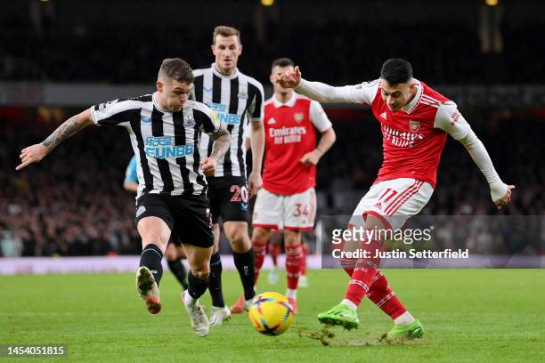 Gabriel Martinelli of Arsenal has a shot on goal whilst under pressure from Kieran Trippier of Newcastle United during the Premier League match...