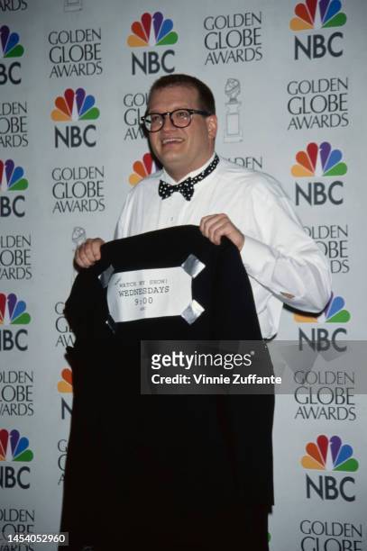 Drew Carey does some self-promotion backstage at Golden Globe Awards Show in Beverly Hills, California, United States, 19th January 1997.