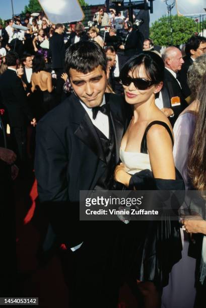 George Clooney and his date attend the 47th Annual Primetime Emmy Awards, held at the Pasadena Civic Auditorium in Pasadena, California, United...