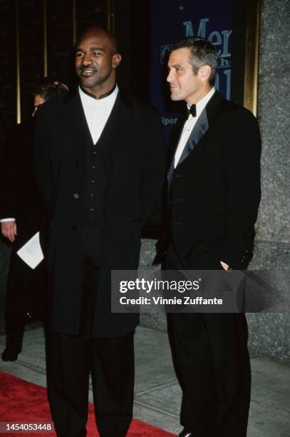 Evander Holyfield and George Clooney during 3rd Annual GQ Men of The Year Awards at Radio City Music Hall in New York City, New York, United States,...
