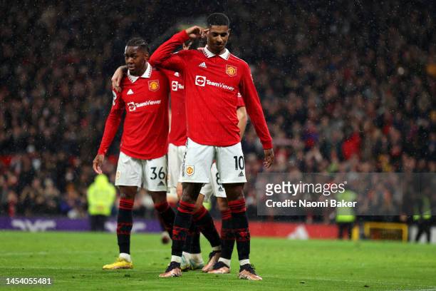 Marcus Rashford of Manchester United celebrates after scoring the team's third goal during the Premier League match between Manchester United and AFC...