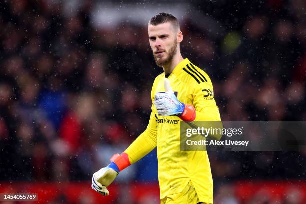 David De Gea of Manchester United celebrates Marcus Rashford scores the team's third goal during the Premier League match between Manchester United...