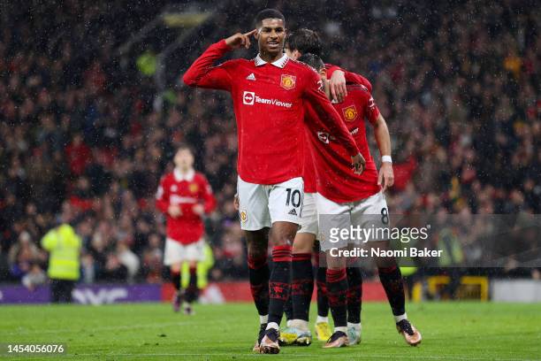 Marcus Rashford of Manchester United celebrates after scoring the team's third goal during the Premier League match between Manchester United and AFC...