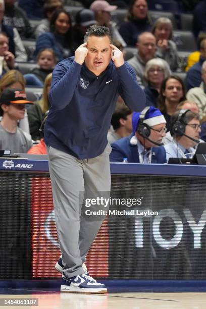 CiNCINNATI, OH Head coach Sean Miller of the Xavier Musketeers signals to his players during a college basketball game against the Seton Hall Pirates...