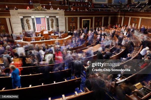 Members-elect of the 118th Congress leave the House Chamber after three ballots failed to elect a new Speaker of the House at the U.S. Capitol...