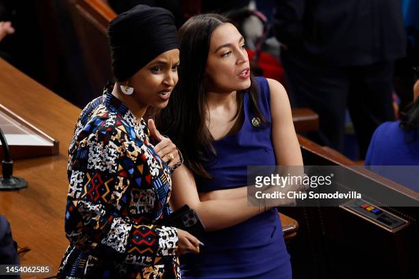 Rep. Ilhan Omar and Rep. Alexandria Ocasio-Cortez talk in the House Chamber after the new Congress failed to elect a new Speaker of the House at the...