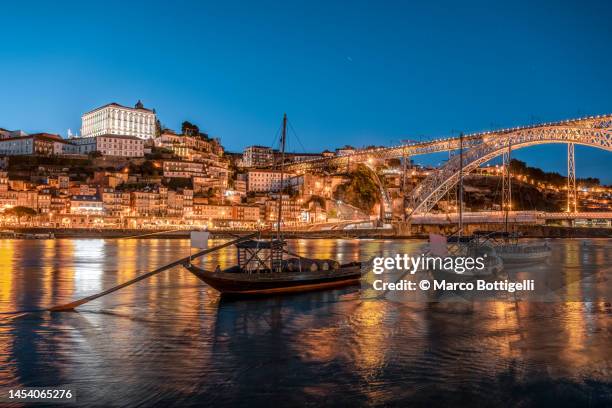 porto and douro river at dusk, portugal - douro river stock-fotos und bilder