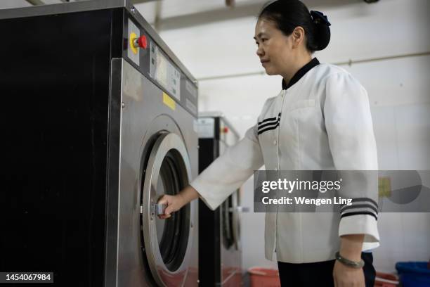 Smart Washing Machine Photos and Premium High Res Pictures - Getty Images