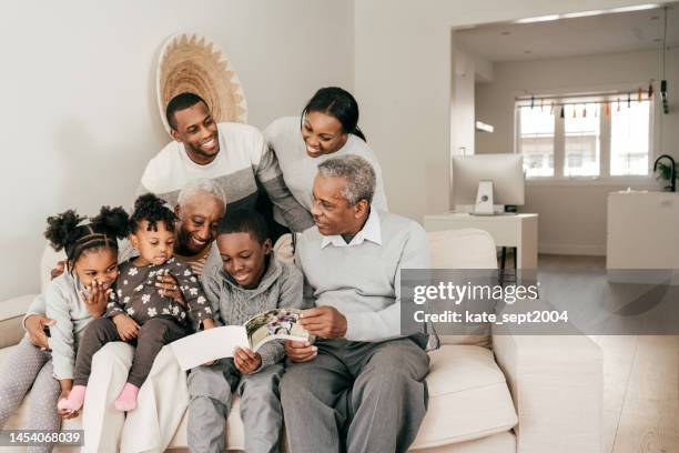 happy family at ome - ome family stock pictures, royalty-free photos & images