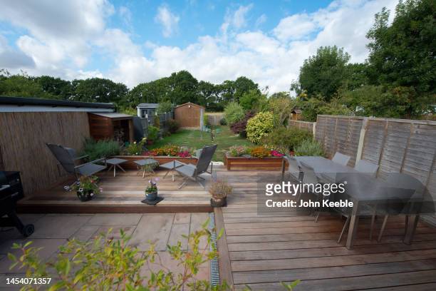 property garden exteriors - backyard deck stock pictures, royalty-free photos & images