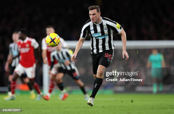 Chris Wood of Newcastle United runs clear of the defence during the Premier League match between Arsenal FC and Newcastle United at Emirates Stadium...