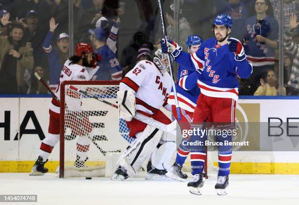 Filip Chytil of the New York Rangers celebrates a first period powerplay goal by Jacob Trouba against Pyotr Kochetkov of the Carolina Hurricanes at...