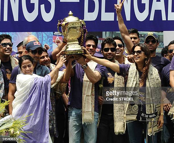 Chief Minister of West Bengal, Mamata Banerjee , along with Shah Rukh Khan, owner of IPL cricket team Kolkata Knight Riders , captain of Kolkata...