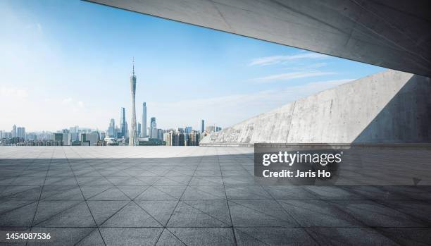 empty abstract concrete space with city skyline - guangzhou imagens e fotografias de stock