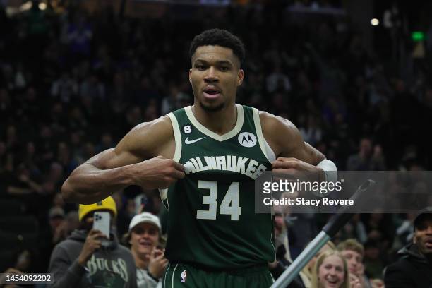 Giannis Antetokounmpo of the Milwaukee Bucks reacts to a score during the second half of a game against the Washington Wizards at Fiserv Forum on...