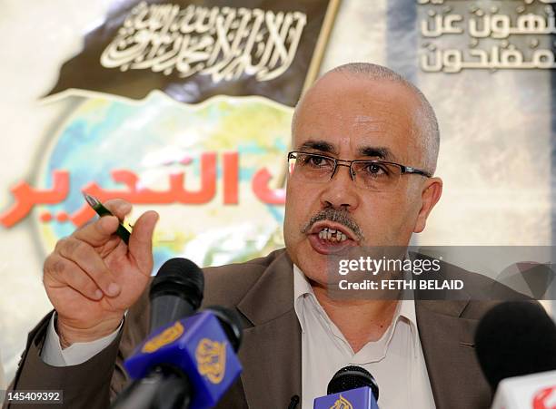 Tunisian Islamist party Hizb At-Tahrir's spokesman Ridha Belhaj speaks during a press conference on May 29, 2012 in Tunis. The Tunisian government...