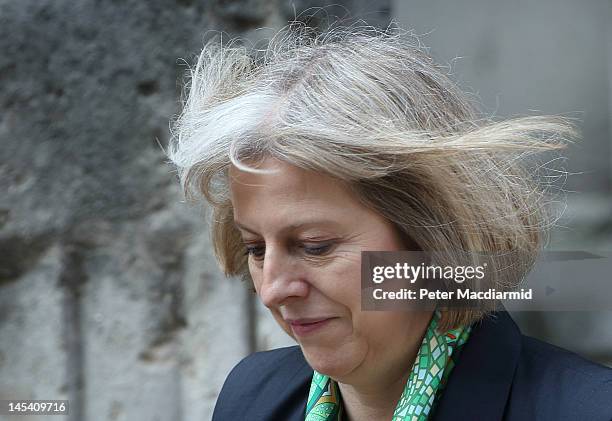 Home Secretary Theresa May leaves The Royal Courts of Justice after giving evidence to The Leveson Inquiry on May 29, 2012 in London, England. This...