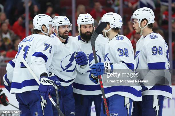 Alex Killorn of the Tampa Bay Lightning celebrates with teammates after scoring a goal against the Chicago Blackhawks during the third period at...