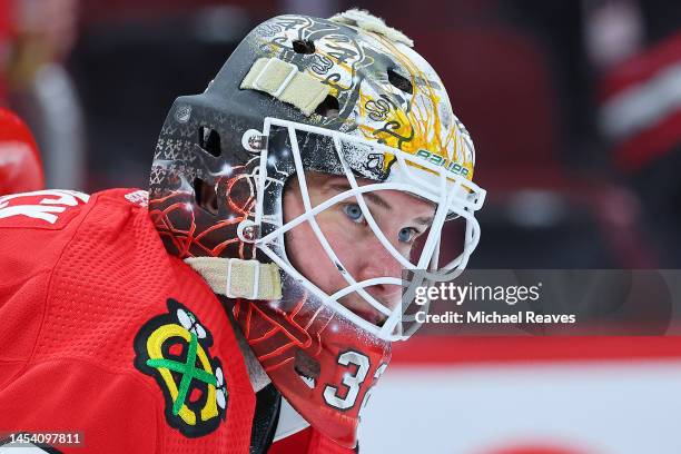 Alex Stalock of the Chicago Blackhawks looks on during the third period at United Center on January 03, 2023 in Chicago, Illinois.