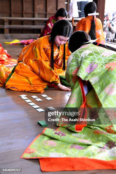 Women dressed in traditional attire from the Heian Period take part in the first 'karuta' game of the New Year at Yasaka Jinja Shrine on January 03,...
