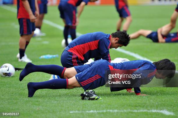 Tokyo players take part in a training session before the AFC Champions League match between Guangzhou Evergrande and F.C. Tokyo at Tianhe Sports...