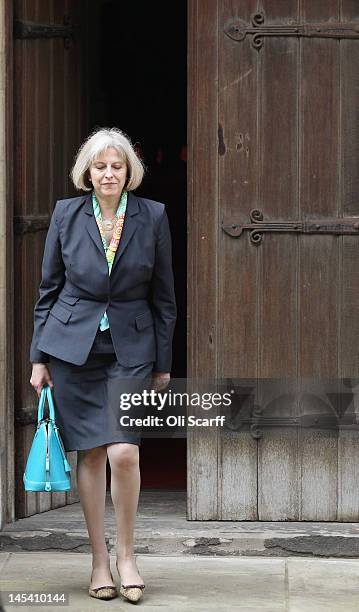 Home Secretary Theresa May leaves The Royal Courts of Justice after giving evidence to The Leveson Inquiry on May 29, 2012 in London, England. This...