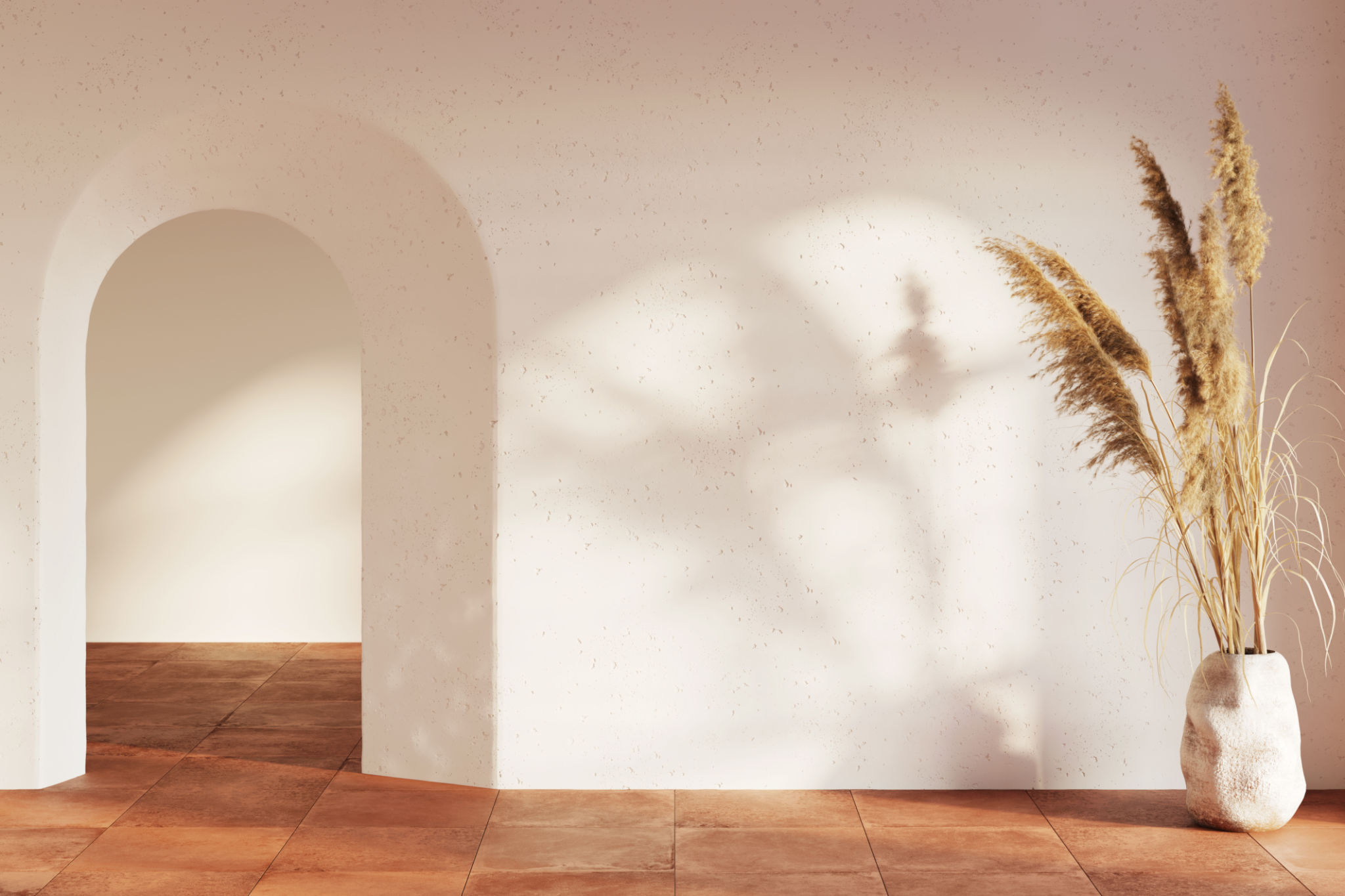 Modern Bali interior with a sunbeam on the blank white wall, arched doorway, large ears of corn in clay vase, terracotta ceramic tile floor. Front view. Modern Bali interior with a sunbeam on the blank white wall, arched doorway, large ears of corn in clay vase, terracotta ceramic tile floor. Front view.