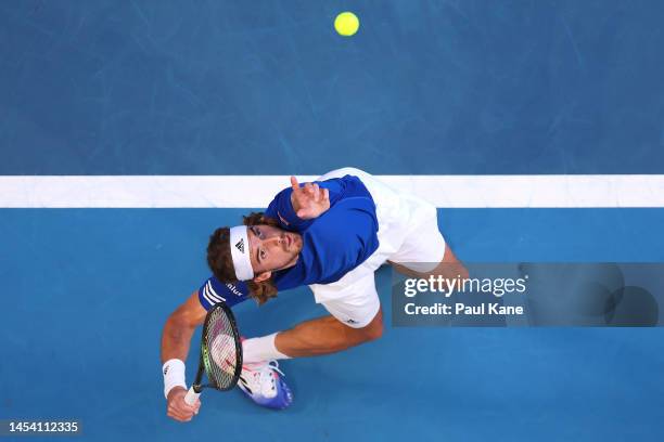 Stefanos Tsitsipas of Greece serves in the Men's singles finals match against Borna Coric of Croatia during day seven of the 2023 United Cup at RAC...