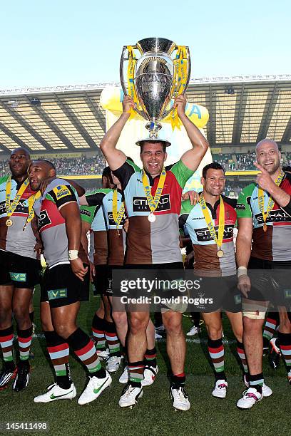 Nick Easter of Harlequins celebrates with the trophy following his team's victory during the Aviva Premiership final between Harlequins and Leicester...