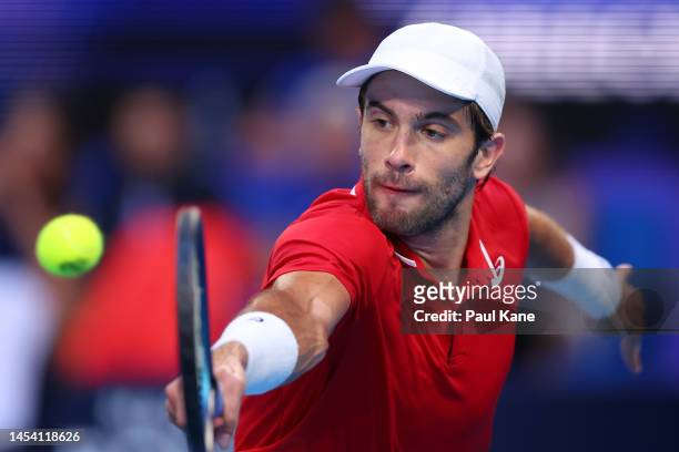 Borna Coric of Croatia plays a backhand in the Men's singles finals match against Stefanos Tsitsipas of Greece during day seven of the 2023 United...